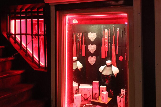 Private red light district & coffeeshop tour with a local - Walking through the Red Light District with context