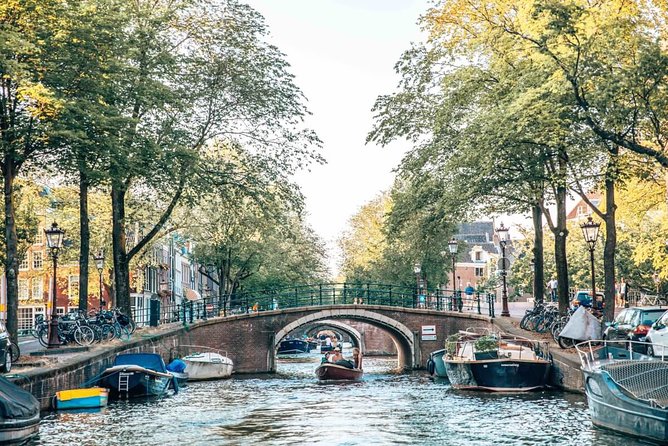 Private Romantic Canal Cruise Amsterdam with Bubbly and Snacks - Out onto the Amstel River
