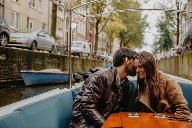 Private Romantic Canal Cruise Amsterdam with Bubbly and Snacks - Houseboats, the shortest canal, and everyday Amsterdam