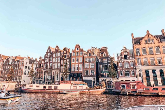 Private Romantic Canal Cruise Amsterdam with Bubbly and Snacks - The Skinny Bridge and the city’s love stories