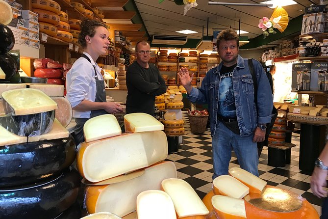 Private Walking Food Tour in Amsterdam - Dutch cheese, herring, and smoked eel