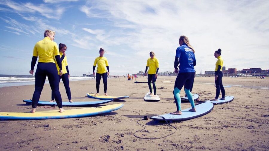 Scheveningen Full-day Surfing lessons with Lunch - Taking your board into the North Sea