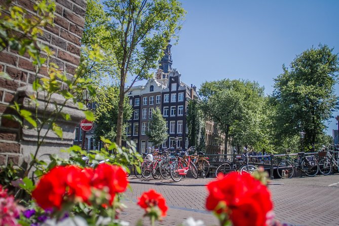 Secrets of Amsterdam Walking Tour plus Dutch Sweets Tasting - Starting beneath Amsterdam’s Royal Palace