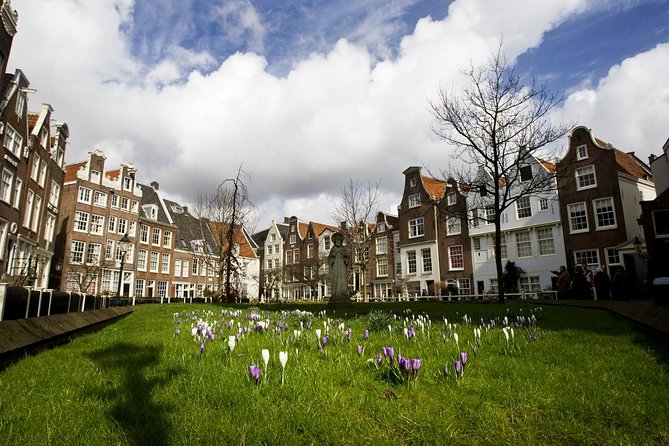 Secrets of Amsterdam Walking Tour plus Dutch Sweets Tasting - The floating Bloemenmarkt