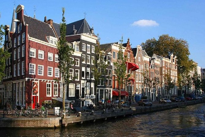 Secrets of Amsterdam Walking Tour plus Dutch Sweets Tasting - What the cheese and port tasting adds