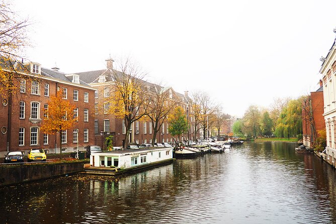 Small Group Hidden Gems Tour in Amsterdam - De Burcht and the workers who changed Amsterdam