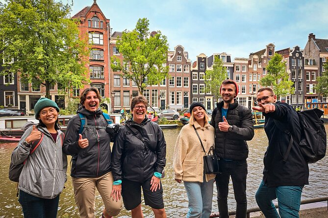 Small Group Walking Tour - Hello Amsterdam - Singel brings out the famous Dancing Houses