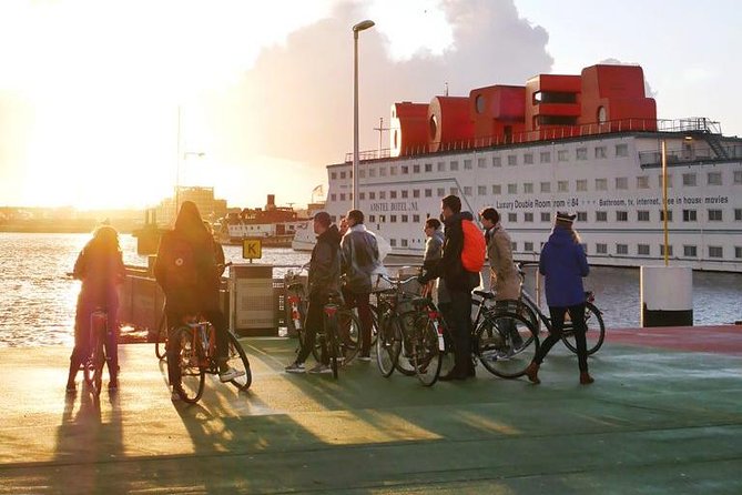 Urban Adventures Amsterdam Bike Tour, Graffiti and Magnet Fishing - Crossing to the north by ferry