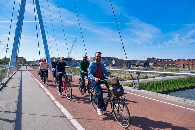 Utrecht Food Tour on a Bicycle with local guide - Little World Kitchen brings global comfort food