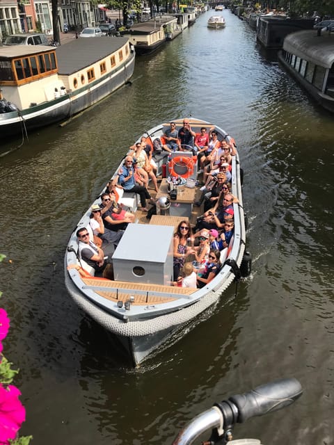 Visit Amsterdam by Boat with a French Guide (french) - Starting with an aperitif on the water