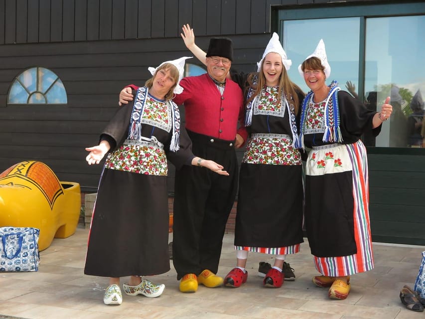Volendam: Traditional Costume Photo with Cheese & Clog Tour - Watching wood become a Dutch clog